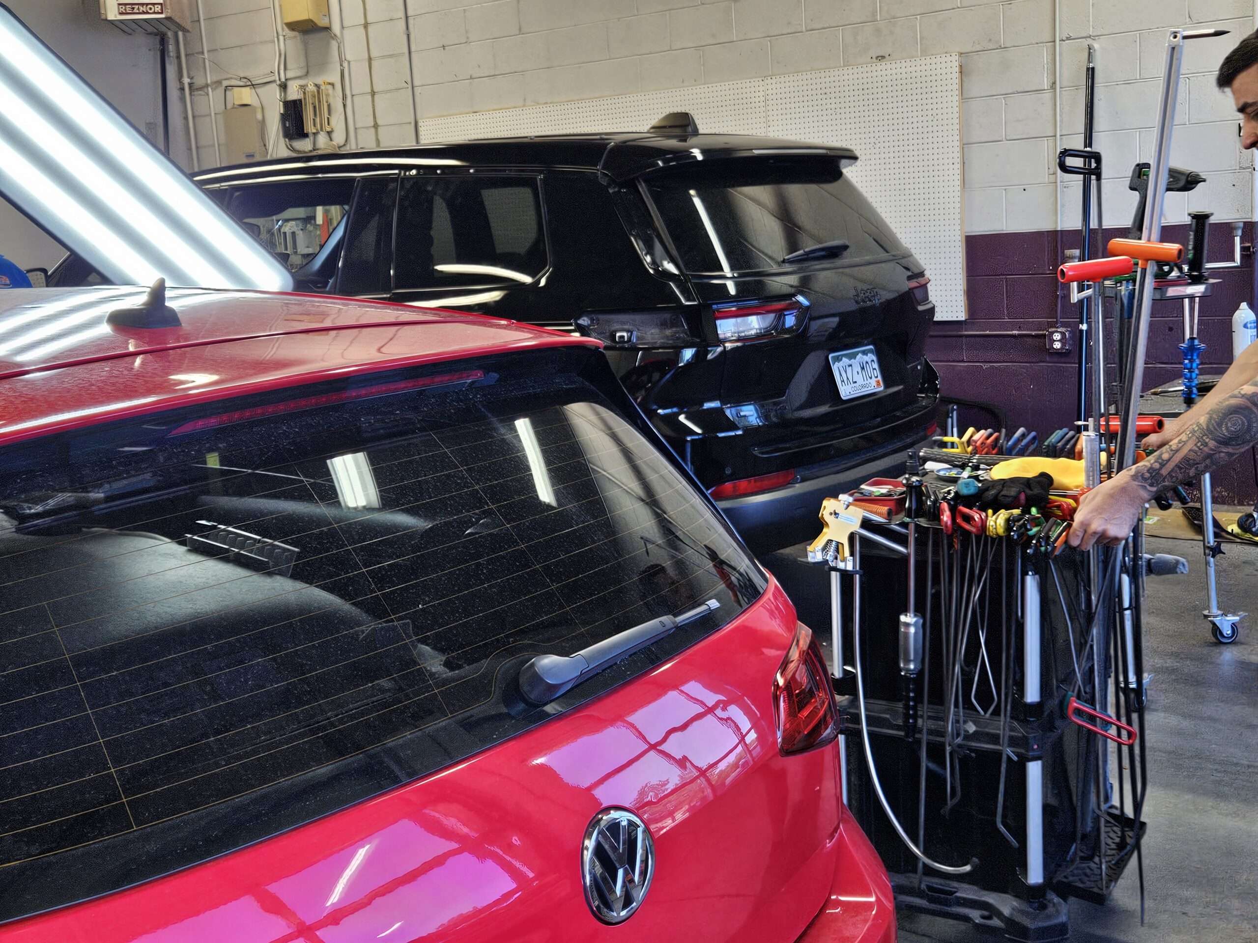 car being fixed from hail damage